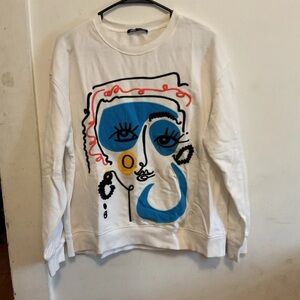 Zara White Sweatshirt with Blue, Black, Yellow & Coral Face Graphic